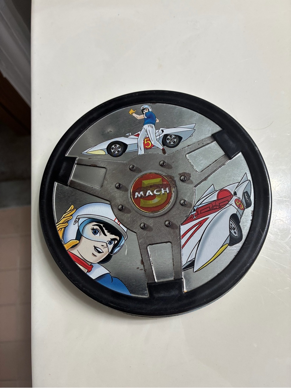 Collectable Speed Racer steering wheel-shaped empty tin DVD case or trinket tin